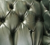 Pair Of Dark Green Leather Wing Chairs 